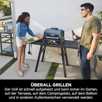 Ninja Woodfire Pro Connect XL Elektrischer BBQ Smoker Grill, App-Steuerung, digitaler Temperaturfühler, Rippenrost, Deckel, großer 7-in-1 Outdoor Grill & Heißluftfritteuse, blau & schwarz OG901EUAMZ